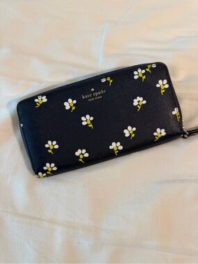 kate spade navy wallet with white and yellow floral print